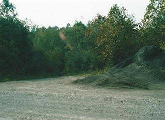 Outside #7 U.G. Mine =Road going to the mine off of haul road, october 2004.