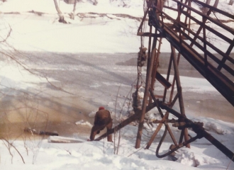 Outside #7 U.G. Mine during blizzard of 1978- Pond that supplied water to the bath house- Bob Green pictured.