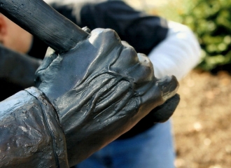 Up close picture of the right hand of the statue. You can see the veins in his hand, little pinky finger is partially missing. October 18, 2013.