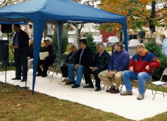 Dedication Ceremony on October 19, 2013, all the speakers sitting up front, waiting to speak. October 19, 2013.