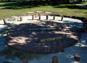 Early stages of brick patio being constructed for the memorial during September 2013.