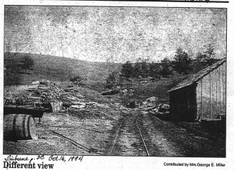 Picture taken out of Coshocton Tribune October 16,1994. Where now you can drive up Sheridan Road and see houses on the left and the right, was once the scene of the Tom Williams Coal Mines. Pictured is the mine entrance in 1901, taken from a view just off of Cambridge Road. Contributor- Mrs. George E. Miller is a resident of Coshocton, Ohio.